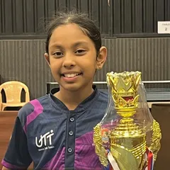 One of our promising young players with her trophy after a dominant performance at the 1st State Ranking Tournament, where she won titles in U-11, U-13, and secured a bronze in U-15.