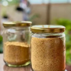 Two jars of freshly made flaxseed pudi. I love having this on hand to sprinkle over rice, idli, or dosa for an instant flavor and nutrition boost.