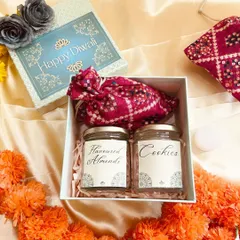 Another look at our traditional Diwali gift box, surrounded by marigold flowers. It's a warm and heartfelt gift for friends, family, or corporate clients.