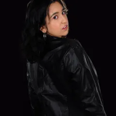 A different angle from the leather jacket photoshoot. My style is a mix of modern, youthful, and a little bit of rock and roll.