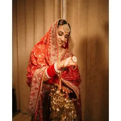 A beautiful moment of the bride with her kalire. This portrait captures the traditions and the happy anticipation of a bride on her wedding day.