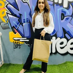 Another happy member of our community, leaving the store with some fresh gear. Our graffiti wall is the perfect spot for that post-cop photo.
