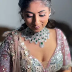 A quiet moment before the reception. Here you can see a close-up of the soft, shimmery eye makeup I created for this client's beautiful pastel lehenga.
