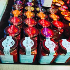 Our stall is always a colourful sight. Here is a look at our non-veg pickles, including the popular squid and prawn varieties, neatly arranged for customers.