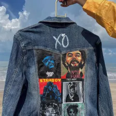 A full view of the hand-painted jacket celebrating The Weeknd's discography. You can see the different album covers like 'Starboy', 'After Hours', and 'Kiss Land' that I recreated with careful detail.