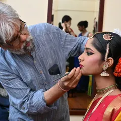 The transformation begins backstage. Here, a makeup artist gives the final touches to my student Anvita Jain, preparing her for the stage. This pre-performance energy is a mix of excitement and focused calm.