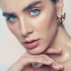 For beauty and skincare campaigns, the focus is all on flawless, healthy-looking skin. Here, I used techniques to create a dewy, glass-skin finish that looks incredible up close, highlighting the model's natural features and bright eyes.