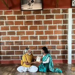 Receiving knowledge from my Guru. He taught me the importance of taking a break to refuel so I can serve my students with more energy and enthusiasm.