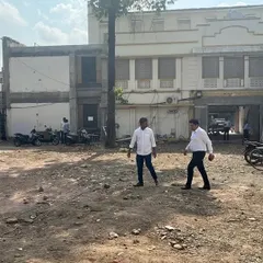 A site visit to the 'Dream City Chambers' project in Amravati. Here we are assessing the initial ground conditions in a tight urban plot, a crucial first step in planning for excavation and foundation work.