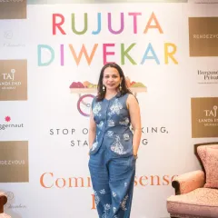 Author Rujuta Diwekar standing proudly in front of the event backdrop for her book launch. It was an honor to capture the campaign shots and the launch event for this milestone.
