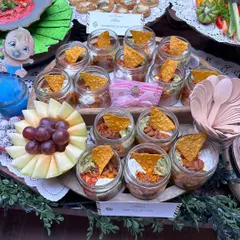 Celebrating new beginnings with food that's as special as the occasion. This baby shower spread features our popular chipotle bean jars, fresh fruit, and other easy to eat bites perfect for mingling.