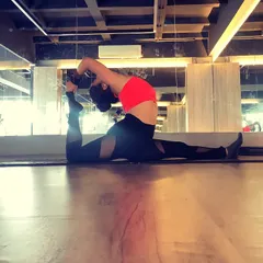 I'm not a natural backbend lover, but I practice them for my spinal health and posture. This is a variation of King Pigeon in splits, a very deep stretch.