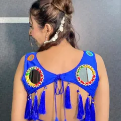 A chic and modern hairstyle for a Navratri look. I created a stylish bun and added a unique silver shell accessory for a touch of festive flair that is both traditional and trendy.