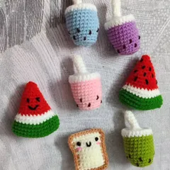 Add some fun to your kitchen with these adorable food-themed fridge magnets. This set includes boba tea, watermelon slices, and a cute slice of bread, all handmade with crochet.