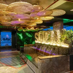 An impressive shot of the water feature and ceiling installation at Social Offline. This highlights the unique architectural and design elements of the space.