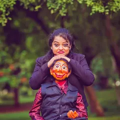 This is Dinku, the charming and witty boy who is my very first puppet. He's my partner in crime, and our conversations on stage are always full of fun and banter.
