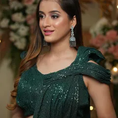 A touch of mystic and a drizzle of pixie dust. This glamorous look with a silver-toned smokey eye and pink lips is perfect for a cocktail party or reception.