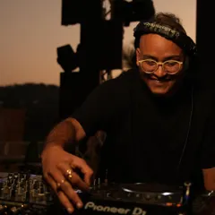 Caught in the moment during a New Year's Eve sundowner set. I love connecting with the crowd and building the energy, especially at outdoor venues and festivals.