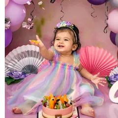 A rainbow dress for a day full of color and joy. My first birthday cake smash sessions are all about celebrating this huge milestone with lots of messy fun.
