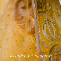 A close-up of this radiant bride, smiling through her veil. The makeup is soft and natural, letting her happiness shine.