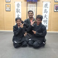 Fun and focus go hand in hand. Our instructor with two of our young warriors after a great class. We aim to make learning martial arts an enjoyable and empowering experience.