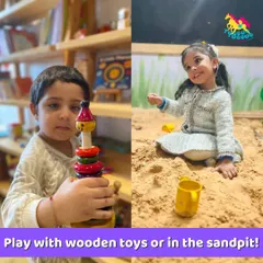 Our play corner is perfect for toddlers, with safe wooden toys for stacking and a sandpit for sensory exploration, all under a parent's watchful eye.