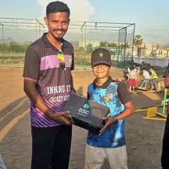 Presenting the award for the 'Best Bowler of the Tournament'. His ability to take crucial wickets under pressure was outstanding. A well-deserved recognition for his efforts.