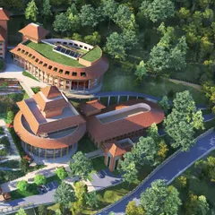 An aerial perspective of the university's academic and administrative blocks, showcasing the use of green roofs and organic forms. The layout is planned to optimize views, daylight, and pedestrian connectivity across the sprawling campus.