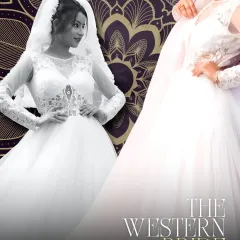 A closer look at the details of my Western bridal gown. The design features a delicate lace bodice and a full tulle skirt, creating a look that is both romantic and sophisticated.