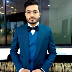 A close-up portrait of the groom. The makeup is clean and matte, perfect for photos and ensuring no unwanted shine during the event.