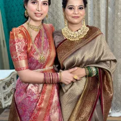 Another beautiful portrait of the sisters. Their makeup is coordinated but tailored to their individual features.