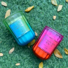 Illuminate your space with our premium scented candles. Featured here are two of my favorites, Vintage Gardenia and Magnolia Peach, in vibrant, colorful jars.
