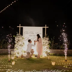 The perfect "Yes" moment. I design the entire experience, from the candlelit path and floral backdrop to the perfectly timed sparklers, ensuring your proposal is a story you will tell forever.