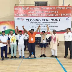 A moment of victory at the closing ceremony of the National Championship Tennis event. Our player stands with officials and fellow competitors, representing the spirit of sportsmanship we instill at ILTA.