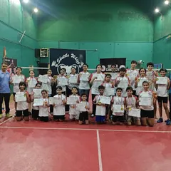 A proud group of our young players and coaches at the Santacruz East branch, showcasing their certificates and medals from a recent event.