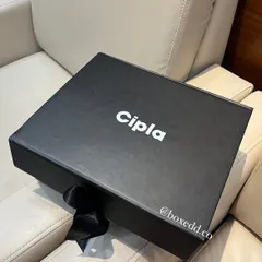 The sleek, custom-branded box for the Cipla New Year gifts. The minimalist design with the company logo is professional and elegant.