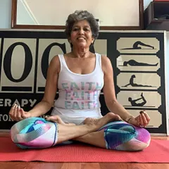 A smile after a fulfilling practice. My classes are not just about physical postures; they are about finding joy, peace, and a little bit of fun on the mat. I welcome everyone with warmth and encouragement.