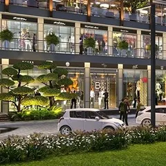 A perspective view of the ground-floor retail frontages. The design provides for on-street parking and is complemented by carefully selected landscaping, including manicured trees and flower beds, to create an attractive shopping environment.