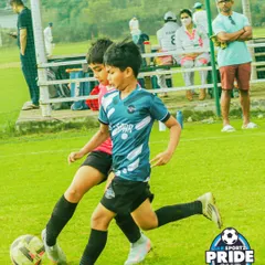 A classic one on one battle for the ball. My leagues are designed to give young players plenty of game time to hone their skills in real match situations.