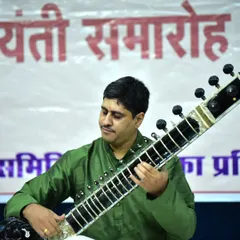 Lost in the melody during a performance at the Pandit Vishnu Krishna Joshi Jayanti Samaroh in Raipur. This photo captures the focus and dedication I bring to every classical recital.
