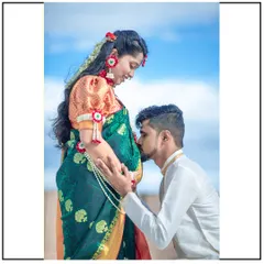 A touching moment as the dad-to-be, dressed in a traditional kurta, kneels to kiss the baby bump.