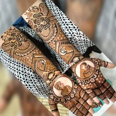 A full bridal design featuring classic Raja-Rani portraits on the palms. This is a timeless way to add a personal and royal touch to your wedding henna.