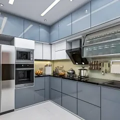 This L-shaped kitchen features high-gloss, light blue-gray cabinets for a super modern and clean look. We've integrated the oven and microwave into the cabinetry for a seamless finish and optimal use of space.