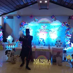 Performing at a beautifully decorated 'My Little Pony' themed birthday party for Naisha. I can adapt my show to fit any party theme, making the celebration even more magical.
