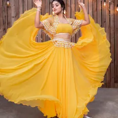 Feel the joy and energy in this vibrant yellow lehenga. Its lightweight fabric and flowing skirt make it ideal for dancing at a Mehendi or Haldi ceremony.
