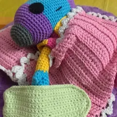 This is Zeno from Dragon Ball Z, tucked in for a nap. A client requested him with a custom-made blanket, pillow, and even a tiny sleep mask.