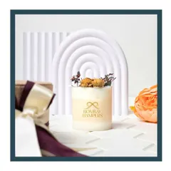 Introducing my own line of branded candles. This one is topped with dried botanicals, offering a scent experience that transports you to another place.