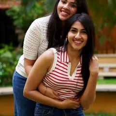 A happy moment with my sister. Our bond is the foundation of Urhythmix, and we strive to make everyone who walks through our doors feel like part of the family.