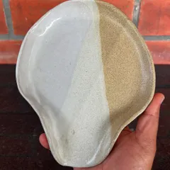 This shell-shaped spoon rest with a two-tone glaze was created by a student in my 15-day combined hand-building and wheel course.