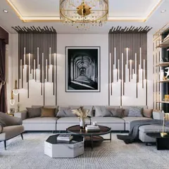 We love making a statement with bold design choices. This living room features dramatic wall accents, a stunning modern chandelier, and a custom coffee bar, all coming together to create a space that is both unique and deeply luxurious.